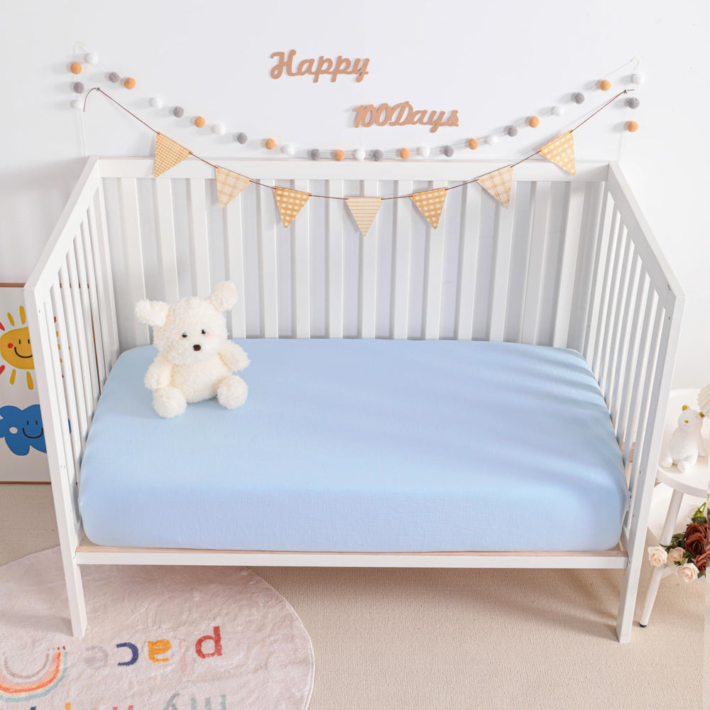 NTBAY two-pack-aqua-crib-sheets packaging focuses on value and simple swapping.