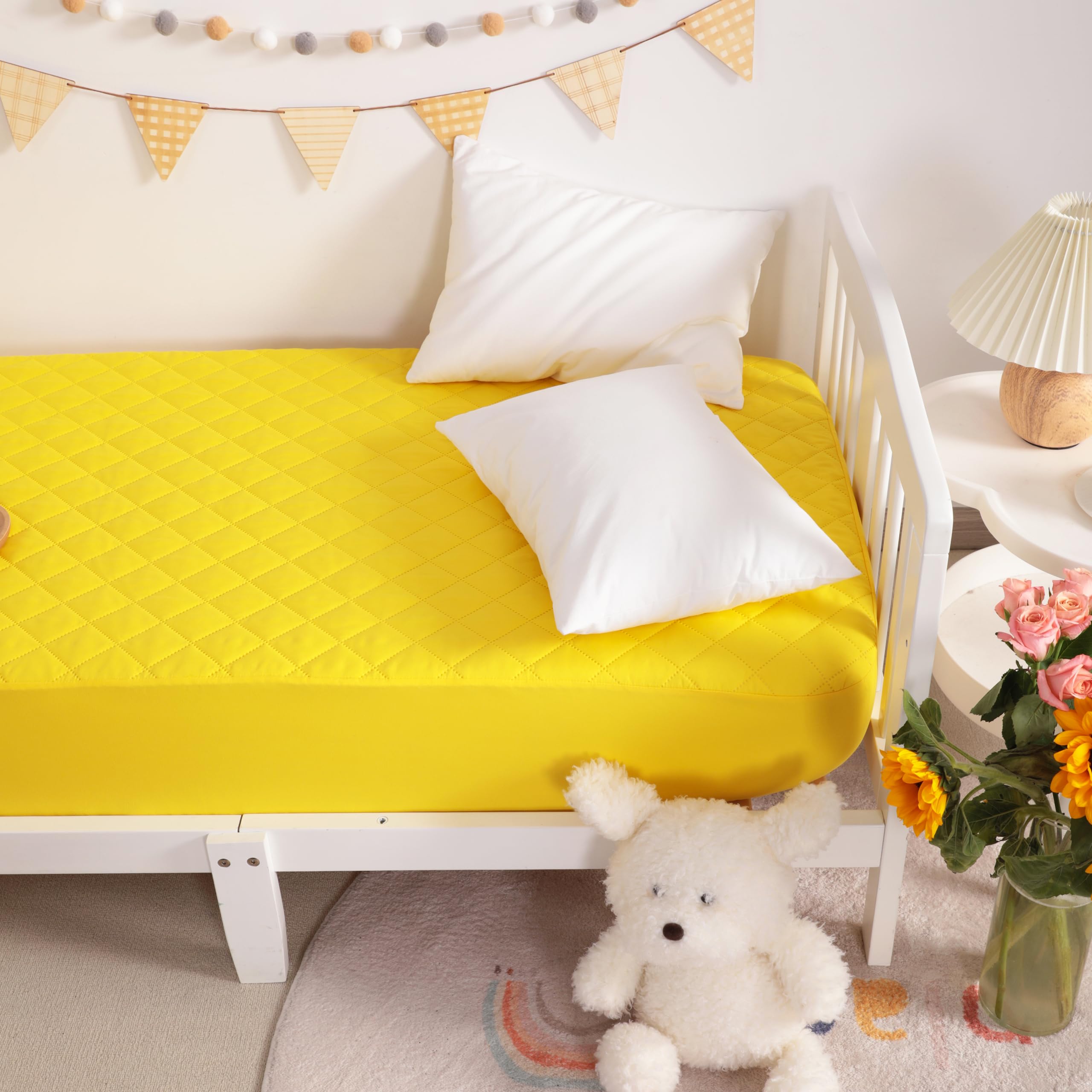 NTBAY two-pack waterproof mini crib mattress protectors provide reliable coverage for accidents.