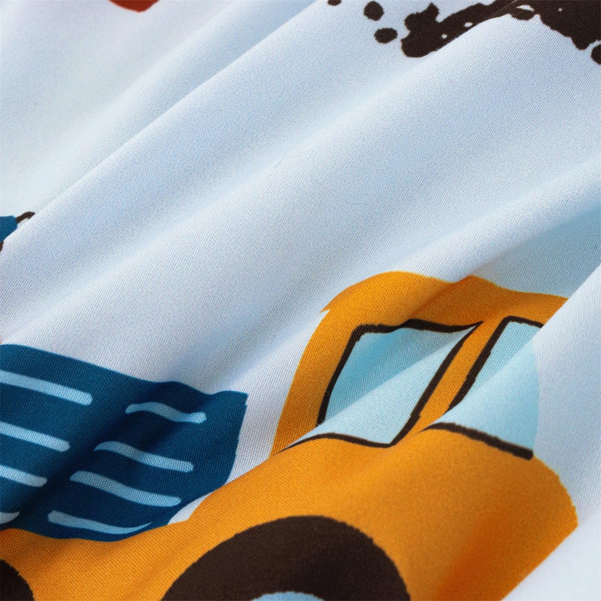 NTBED bed scene with construction truck bedding creating a kid-friendly sleep space