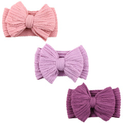 NUARTNOS purple baby nylon headband close-up shows soft breathable fabric for delicate skin.