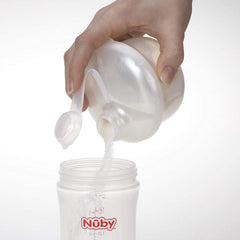Nuby dispenser shows attached cap and top-slide lid for easy access during travel.