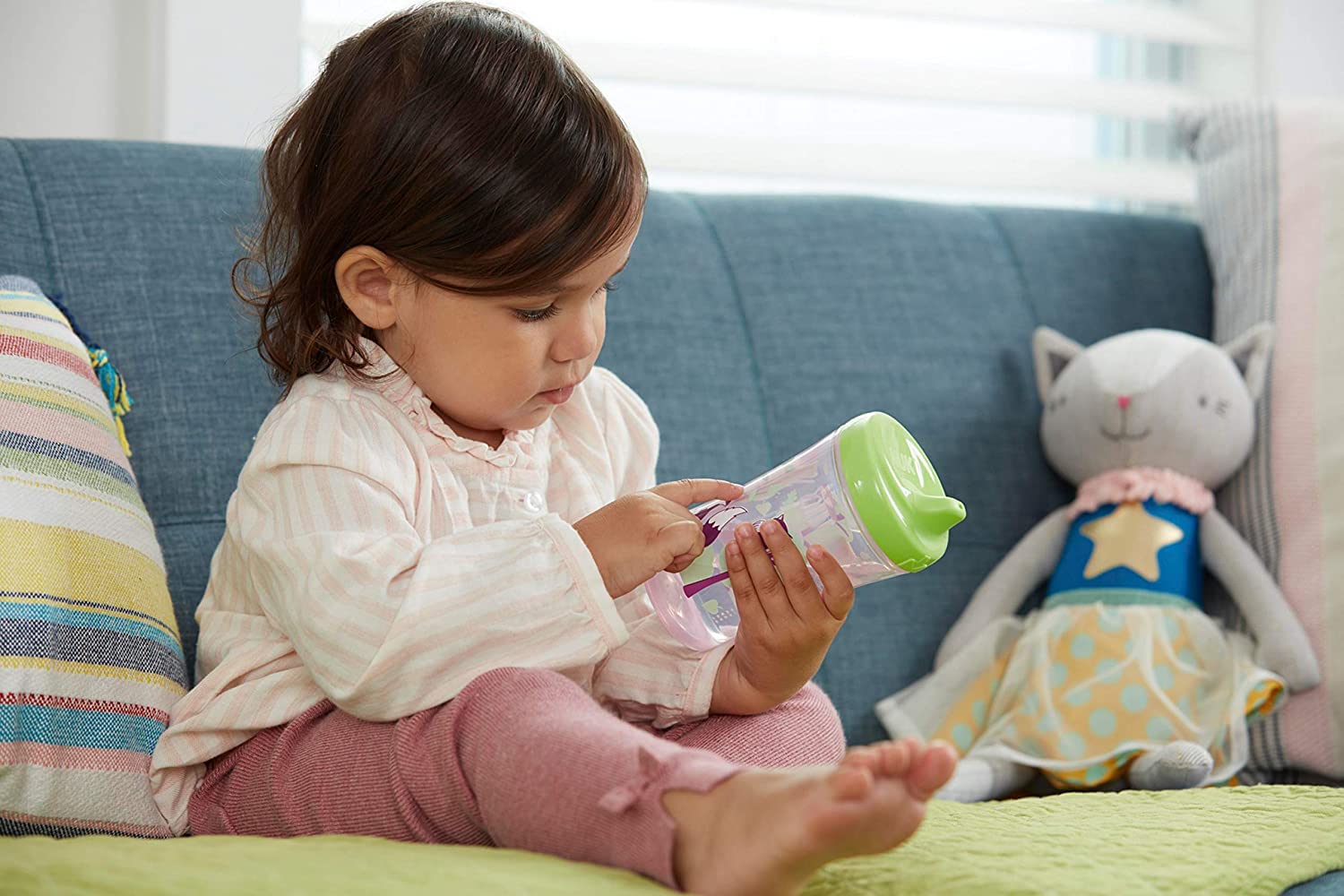 NUK flow-control valve close-up shows easy, measured sips for growing toddlers