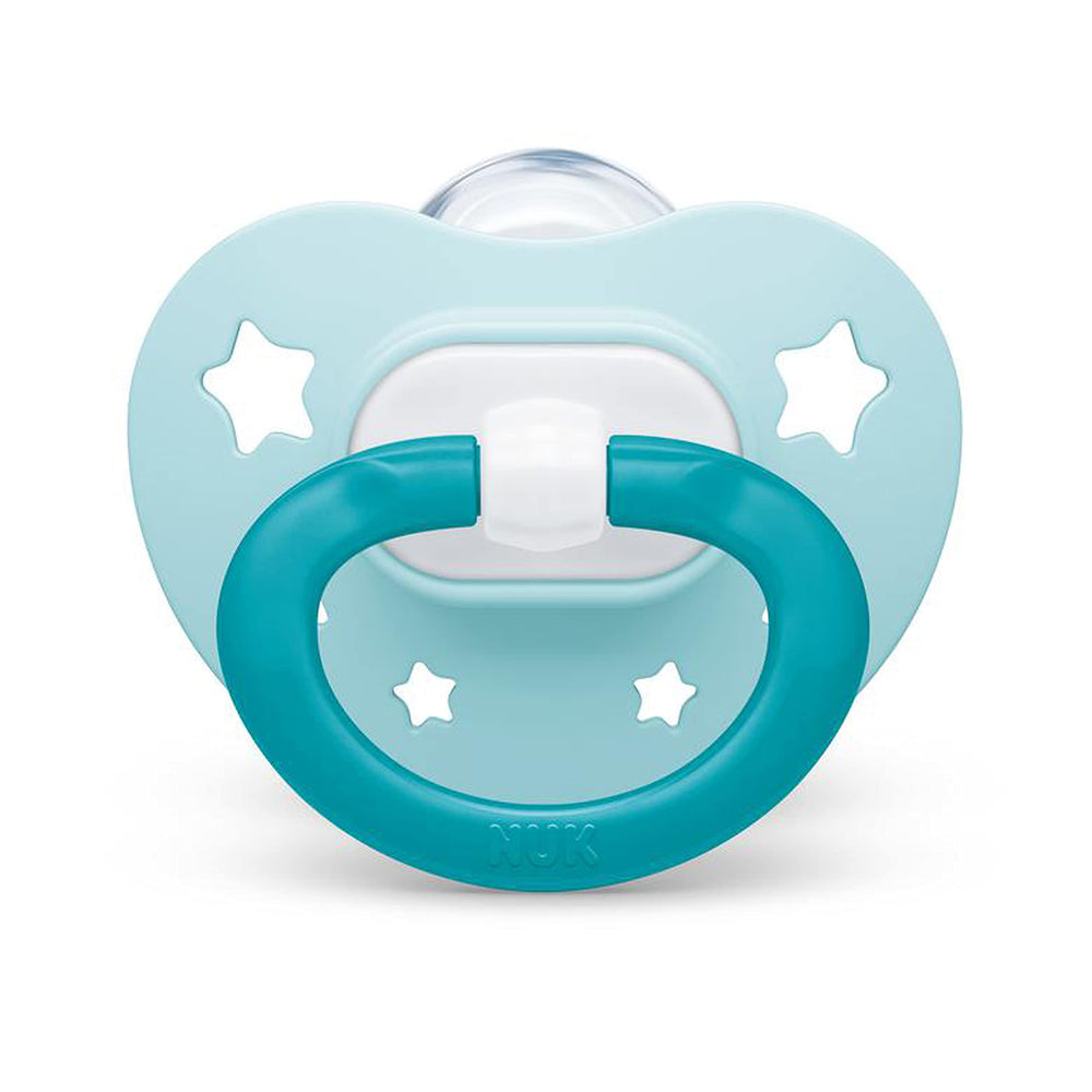 NUK heart-shaped shield under baby's nose promotes easy breathing