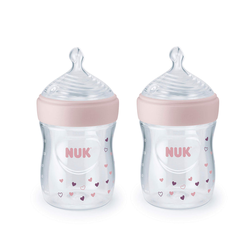 NUK Simply Natural 5oz bottle with pink hearts supports natural latch and soothing feeding.