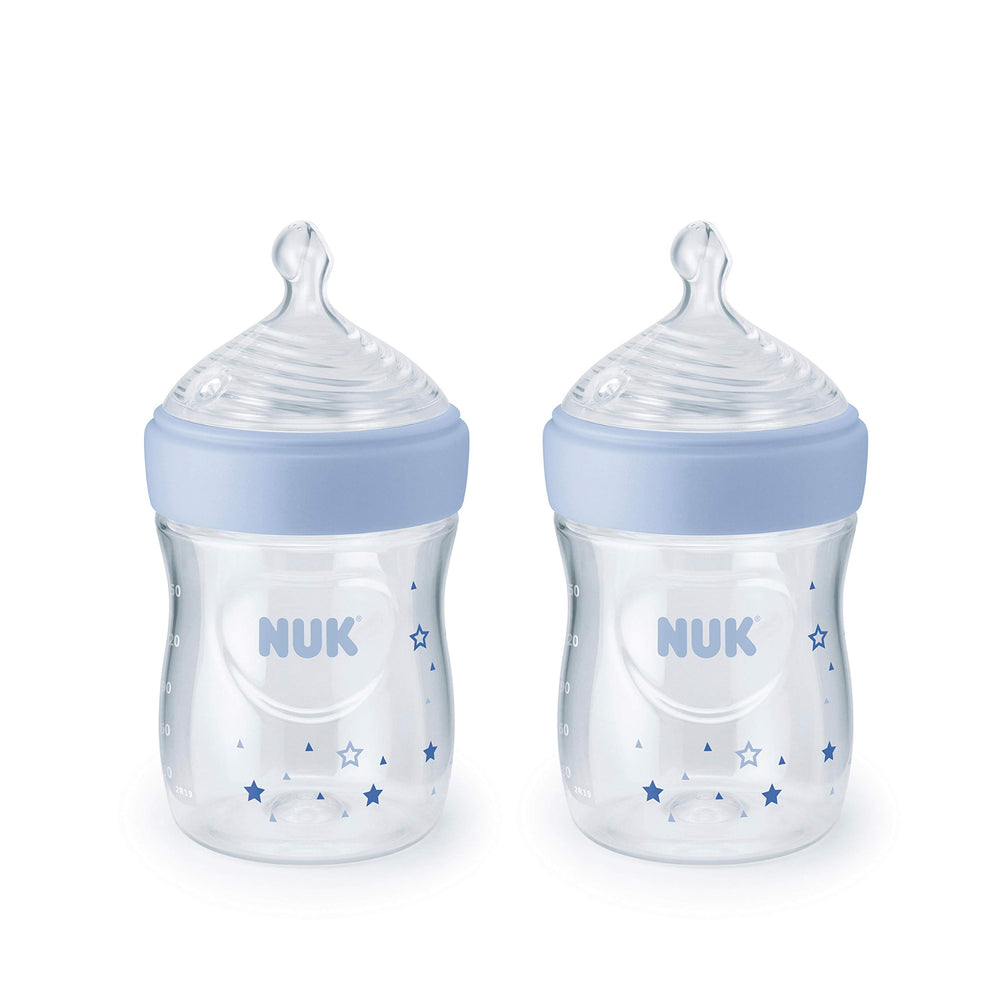 NUK Simply Natural bottle front view with blue stars supports natural-feel feeding