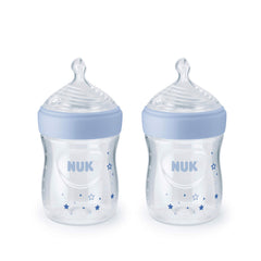 NUK Simply Natural bottle front view with blue stars supports natural-feel feeding