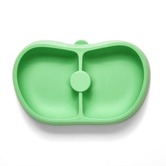 Nummy Bowl hidden suction cup in use demonstrates secure grip during feeding