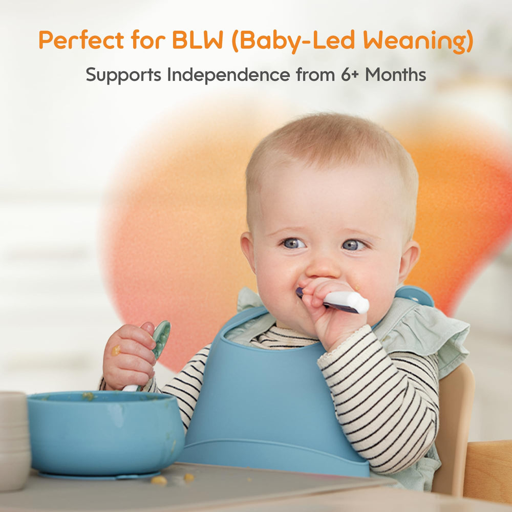 NumNum pre-spoon close-up showing thick contoured handle for secure grip on tiny hands.