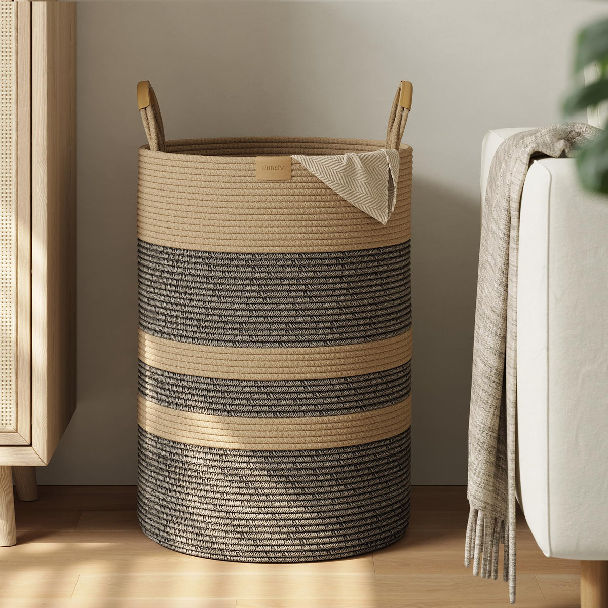 Nunsino 95L striped laundry hamper with leather handles enabling easy transport and clutter reduction.