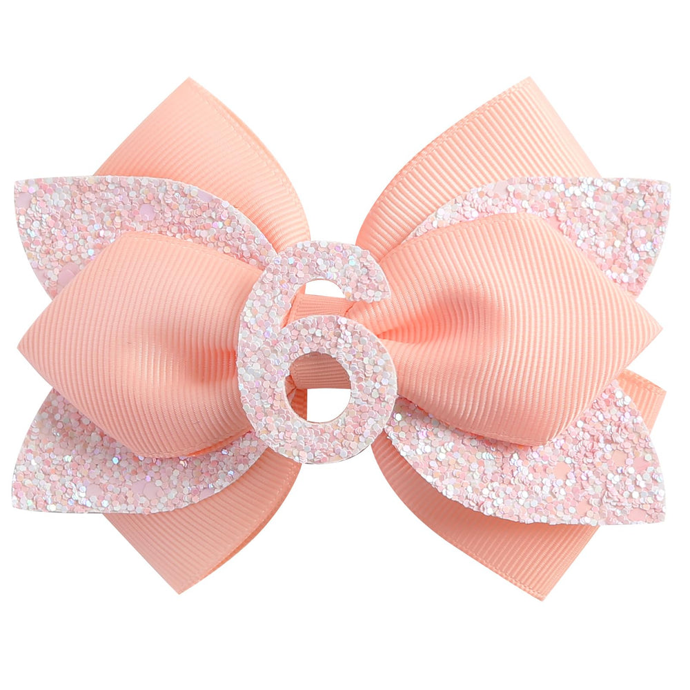 Nuolich glitter birthday bow peach front view for festive baby girl outfits.