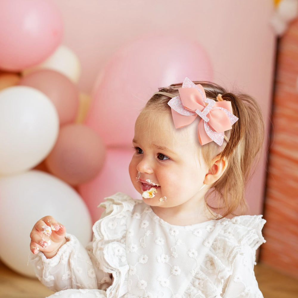 Nuolich glitter birthday bow peach with number 6 detail for age celebration.