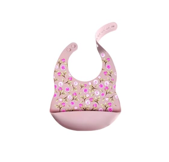 NURTUREBLOOM silicone feeding bib with blush pink roses for mess containment during feeding.