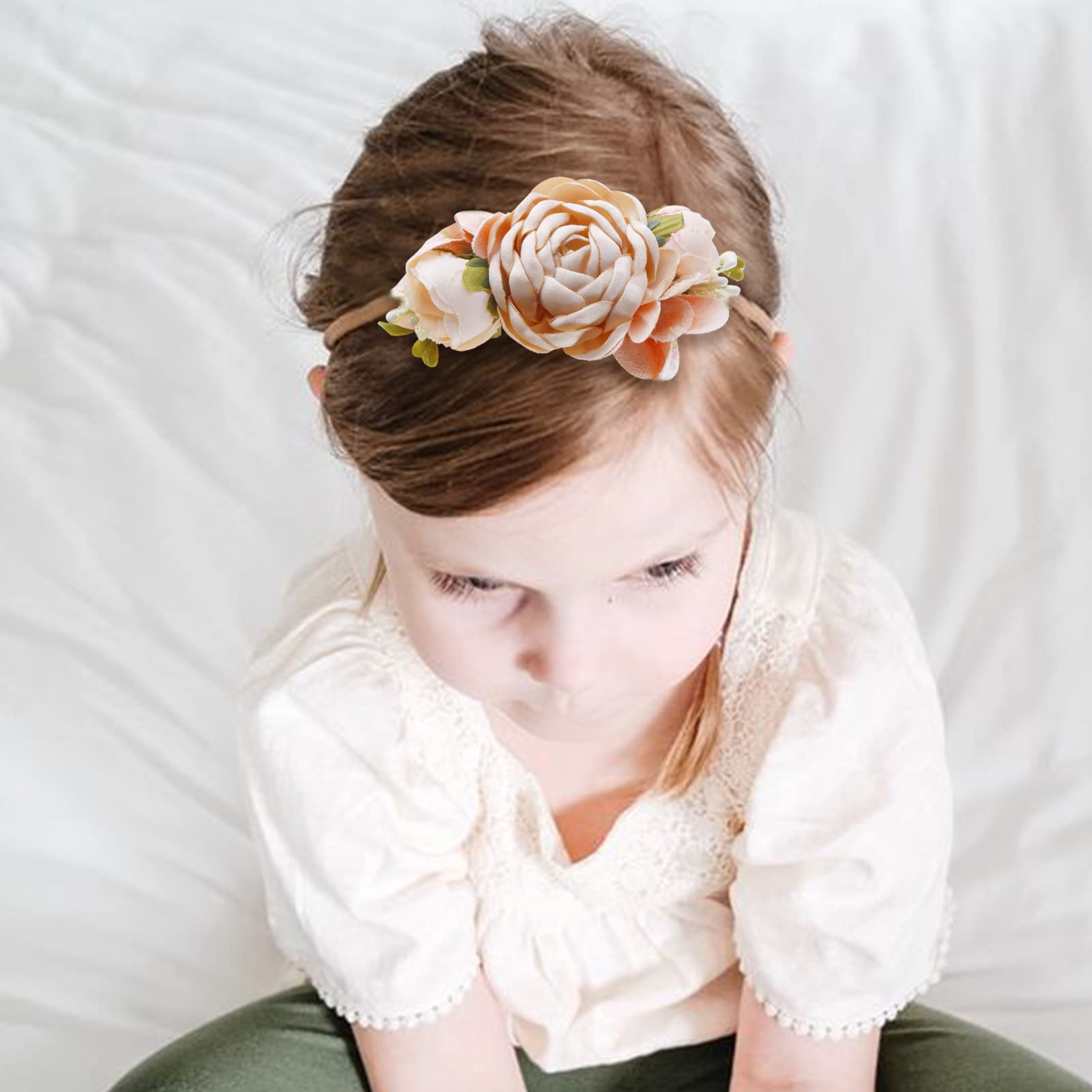 NUWAJP baby-accessory collection offers versatile flower headbands for many looks.