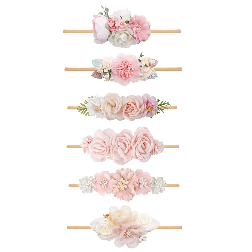 NUWAJP Flower Headband wearing-infant image demonstrates secure fit and comfortable elasticity.