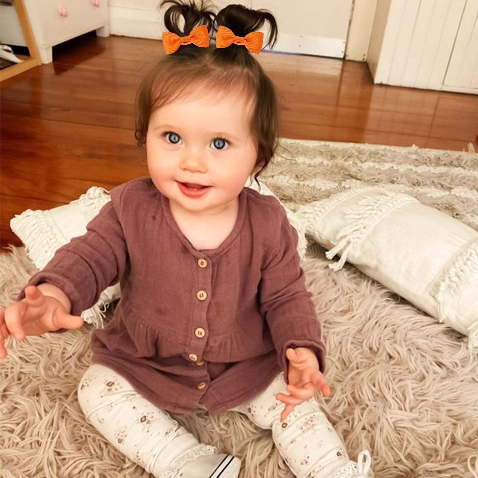 OAOLEER pink bows 2inch hair ties add gentle color for tidy baby styling.