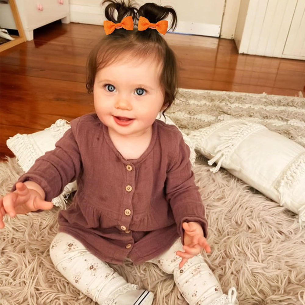 OAOLEER pink bows 2inch hair ties add gentle color for tidy baby styling.
