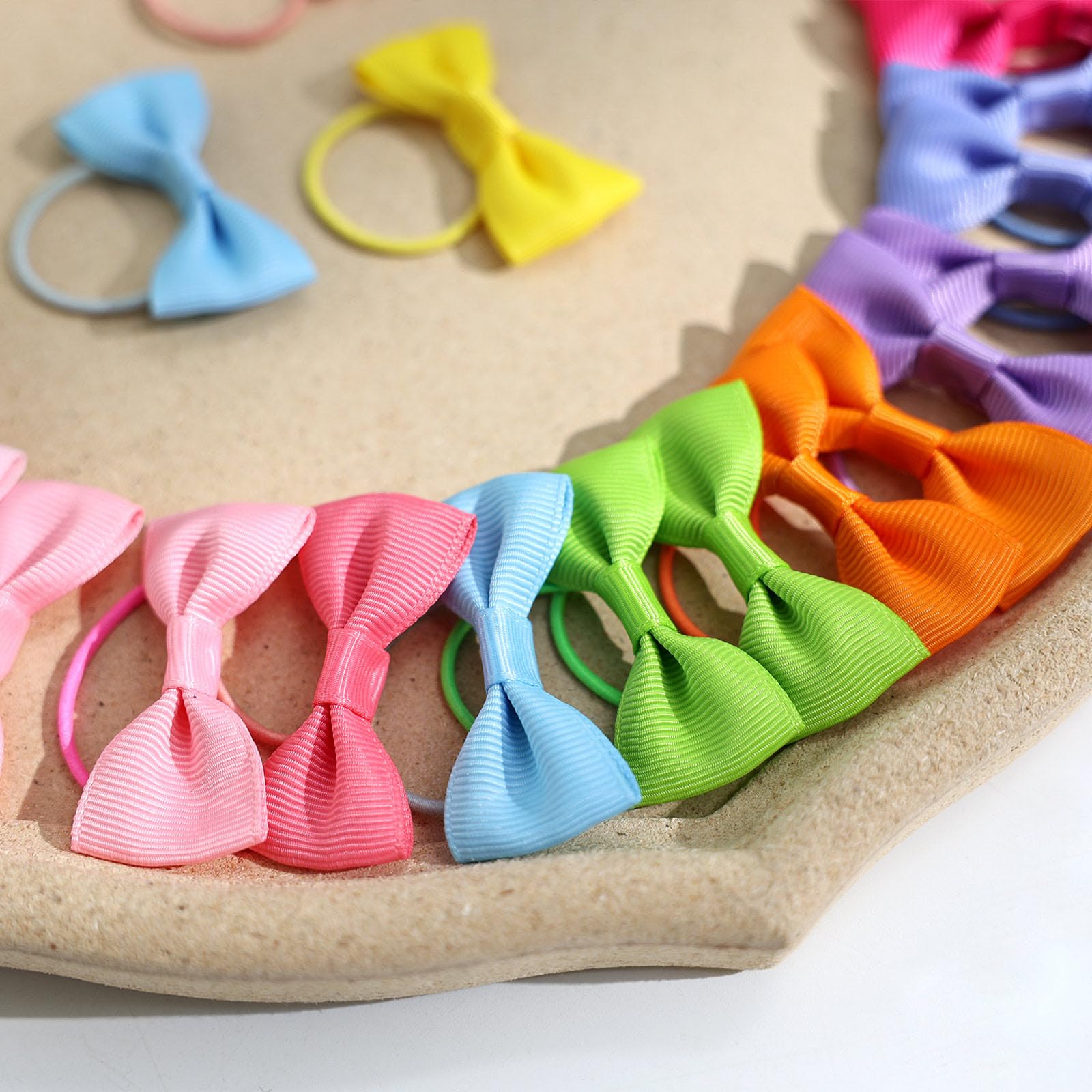 OAOLEER soft grosgrain ribbon bows on elastic ties feel silky and secure.