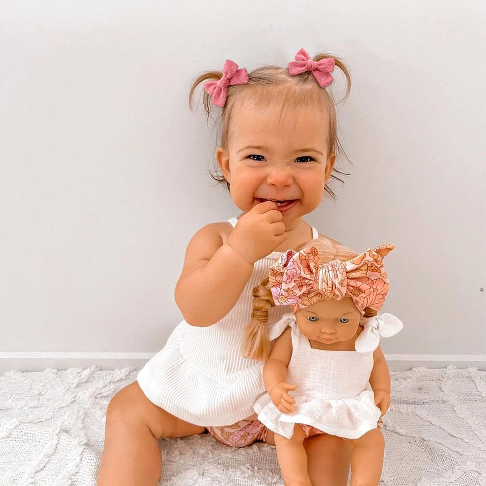 OAOLEER tiny 2.7-inch bows add charming detail to ponytails or braids.
