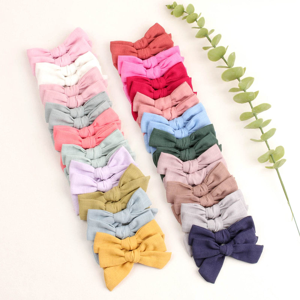 Oaooleer alligator-clip bow provides stable grip to keep hair away from face