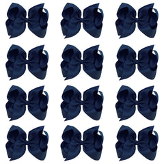 Oaooleer big navy bow on an alligator clip adds polished everyday style.