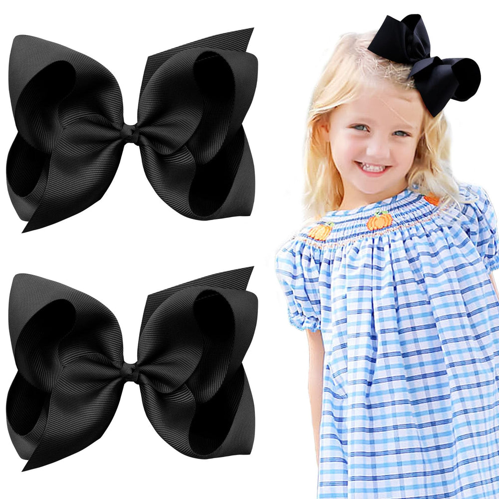 OAOLEER black layered grosgrain ribbon alligator clip closeup showing secure grip for toddlers.