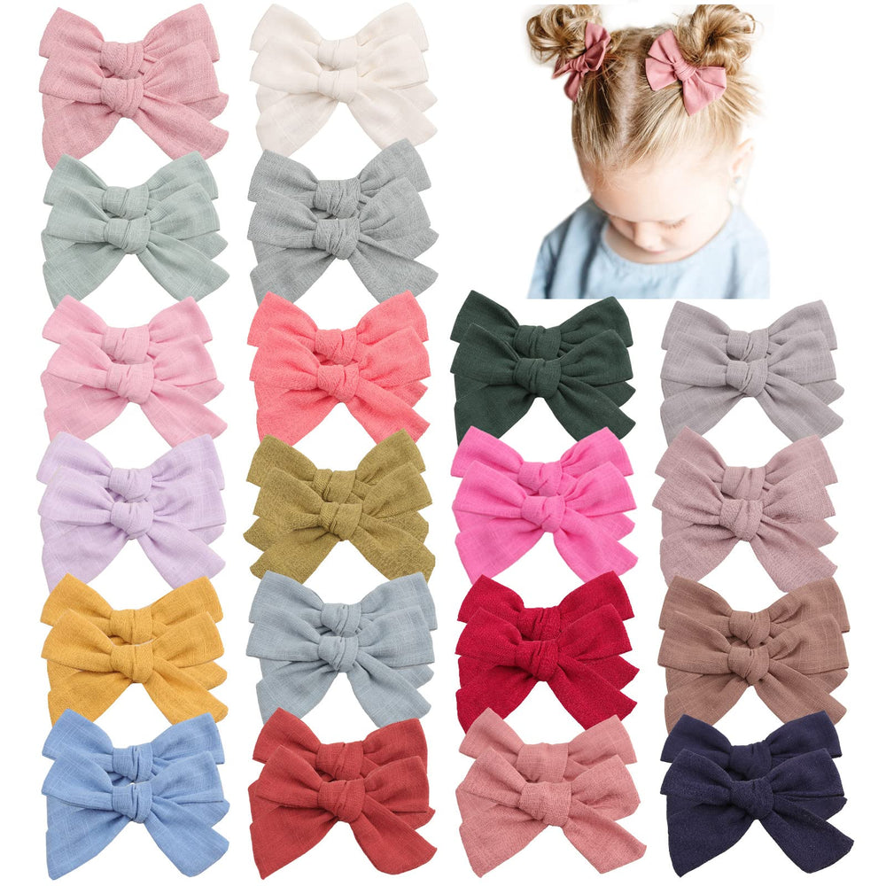 Oaooleer neutral linen pigtail bow close-up showing soft texture and 3.5-inch size for everyday outfits