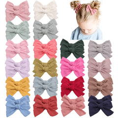 Oaooleer neutral linen pigtail bow close-up showing soft texture and 3.5-inch size for everyday outfits