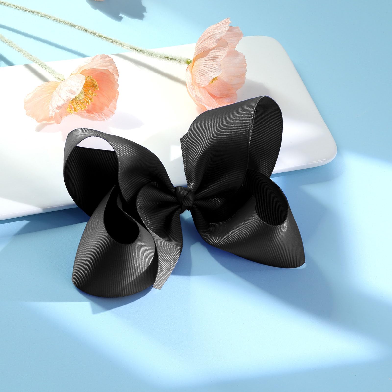 OAOLEER packaging shows two-piece hair bows ready for gifting.