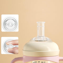 Oberni Toddler Sippy Cup removable handle supports easy grip for small hands.