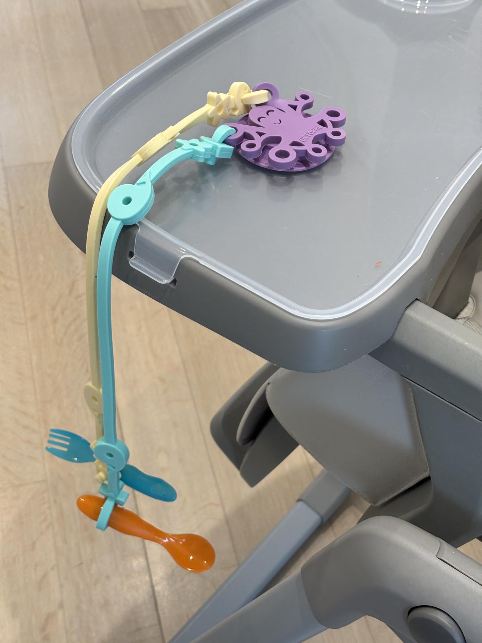 Octopal Baby Tether Straps 3-pack displayed on table to illustrate mess-free mealtime.