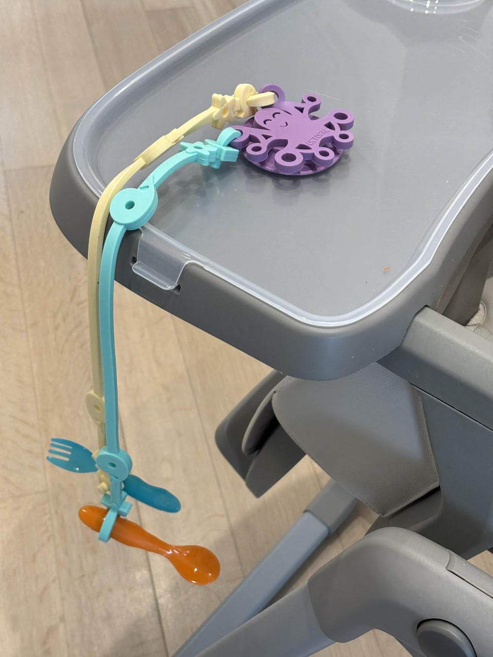 Octopal Baby Tether Straps 3-pack displayed on table to illustrate mess-free mealtime.