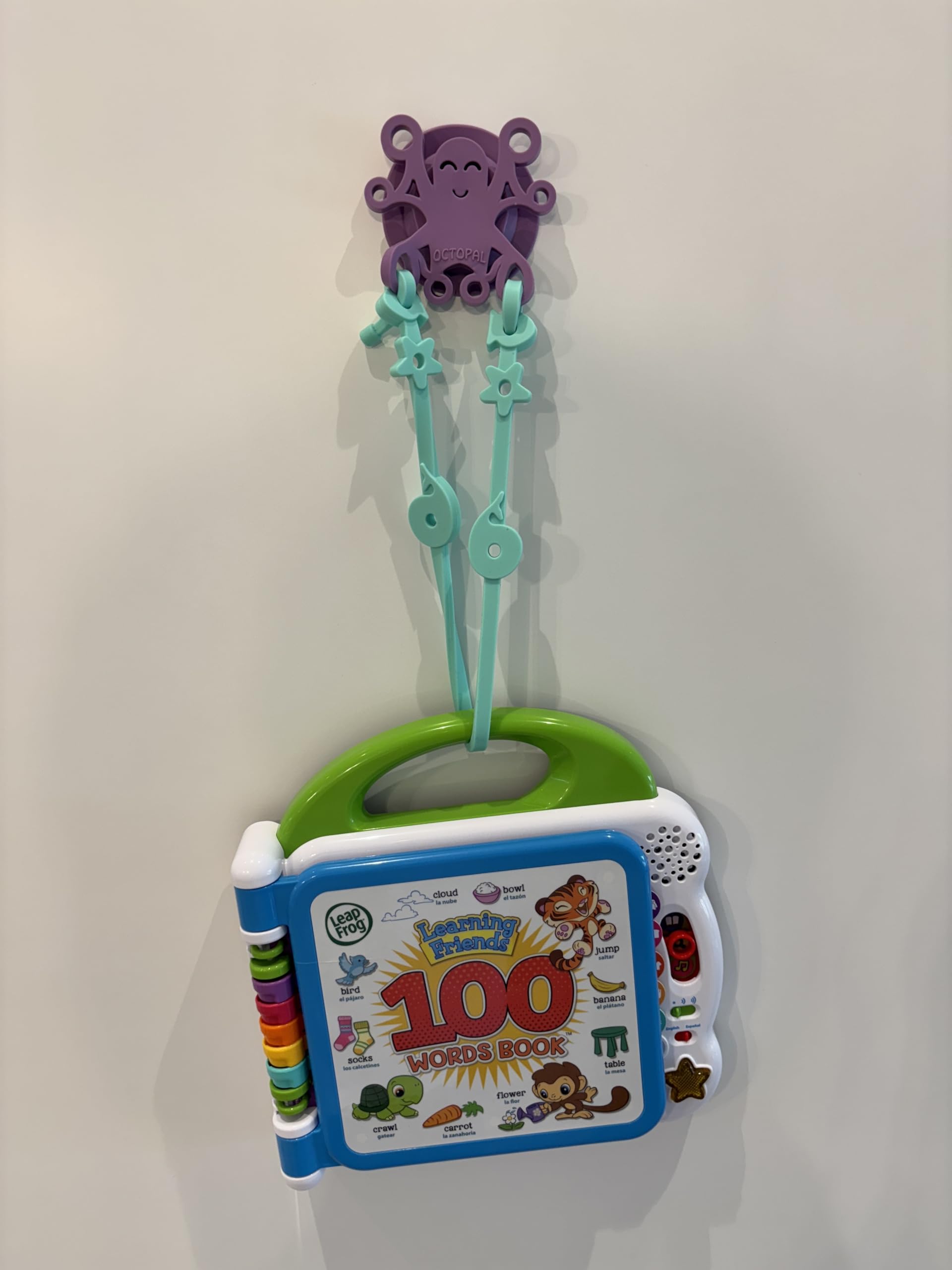 Octopal Baby Tether Straps used with cups and utensils during playtime.