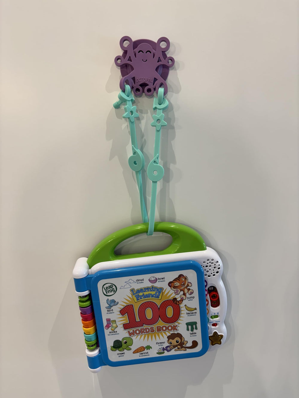 Octopal Baby Tether Straps used with cups and utensils during playtime.