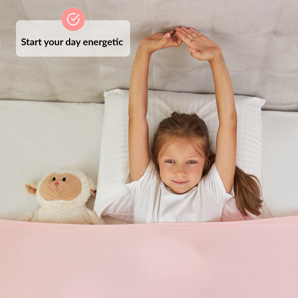 ODOXIA sensory sheet bedside view illustrates secure, snug coverage across the mattress.