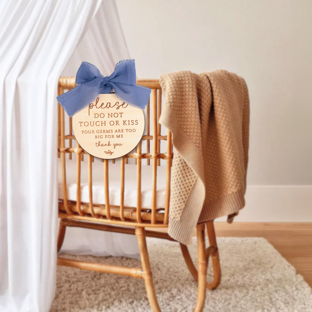 OENIZI blue sign laser-engraved on natural wood for durability