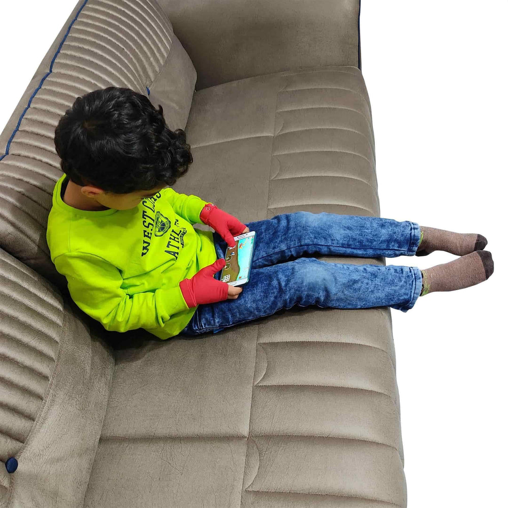 OFFA Thumb Sucking Stop gloves on child hand enabling unrestricted activity