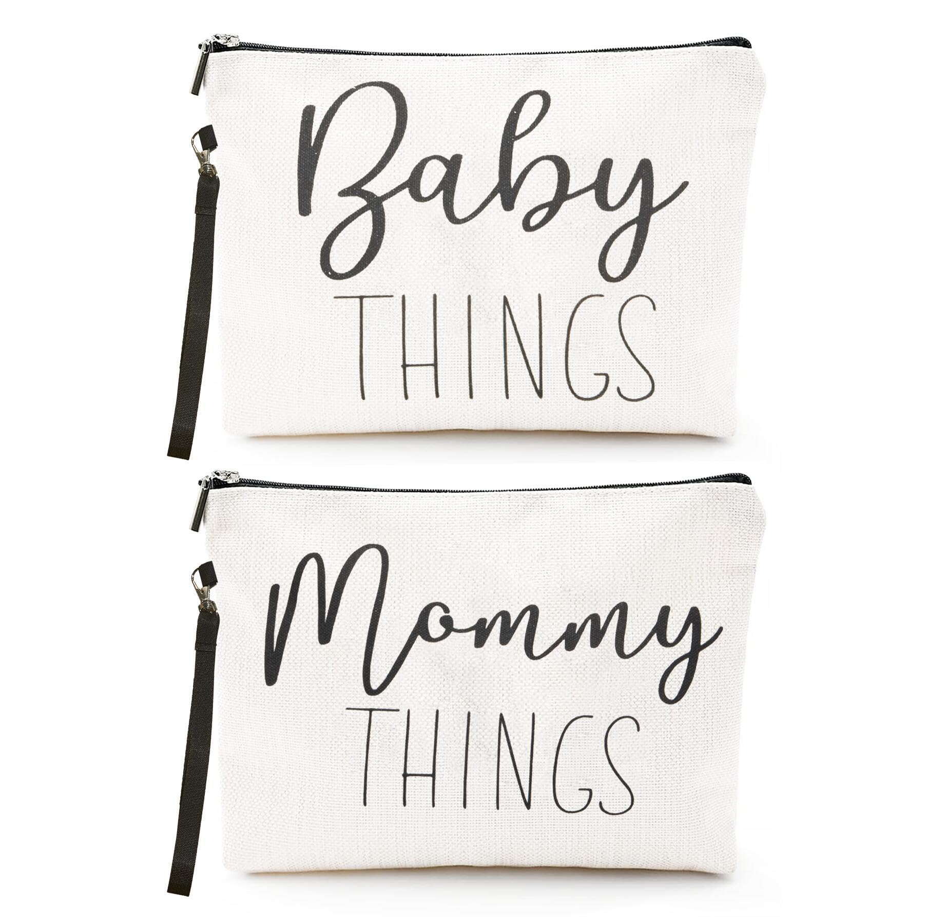 Ohmique Mommy & Baby Bag front view in canvas supports on-the-go organization