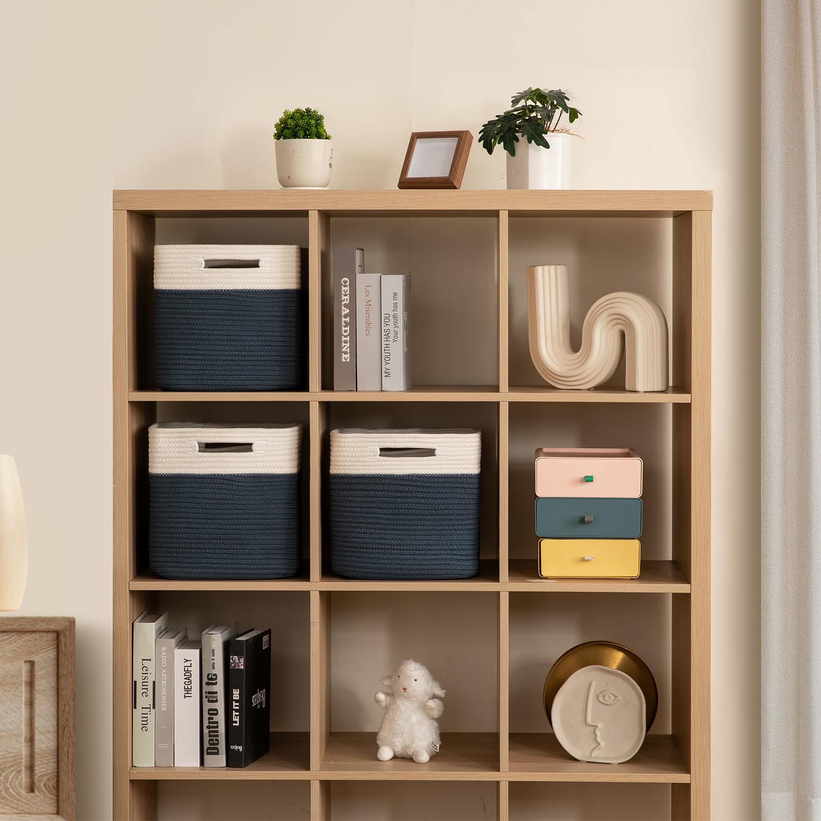 OIAHOMY 3-pack woven baskets handles, convenient for toy storage.