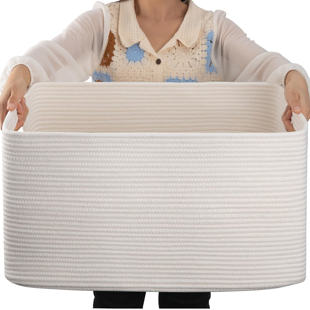 OIAHOMY 75L blanket basket on sofa showing ample storage for throws and pillows