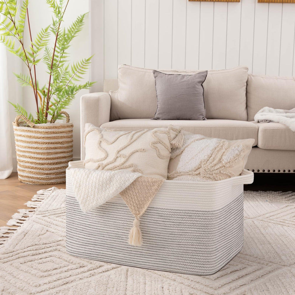 OIAHOMY blanket basket with sturdy handles for easy transport and daily tidy-ups.