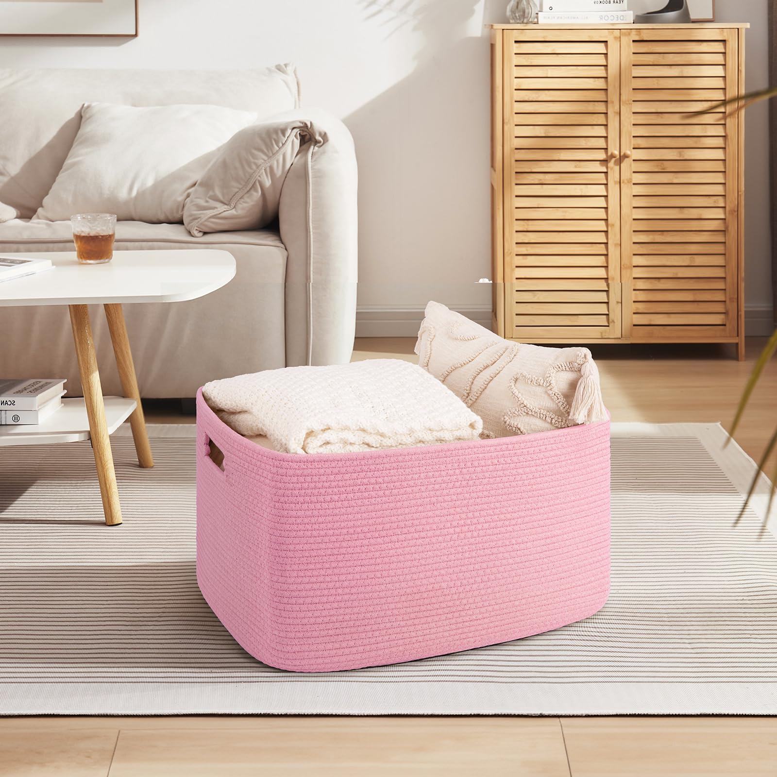 OIAHOMY blanket basket in living room neatly organizing throws and cushions.