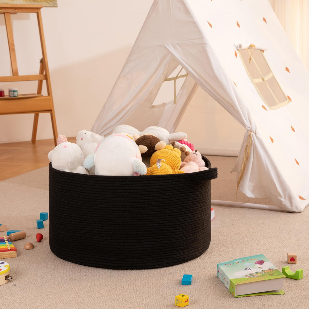 OIAHOMY blanket basket in the laundry area doubles as a portable hamper.