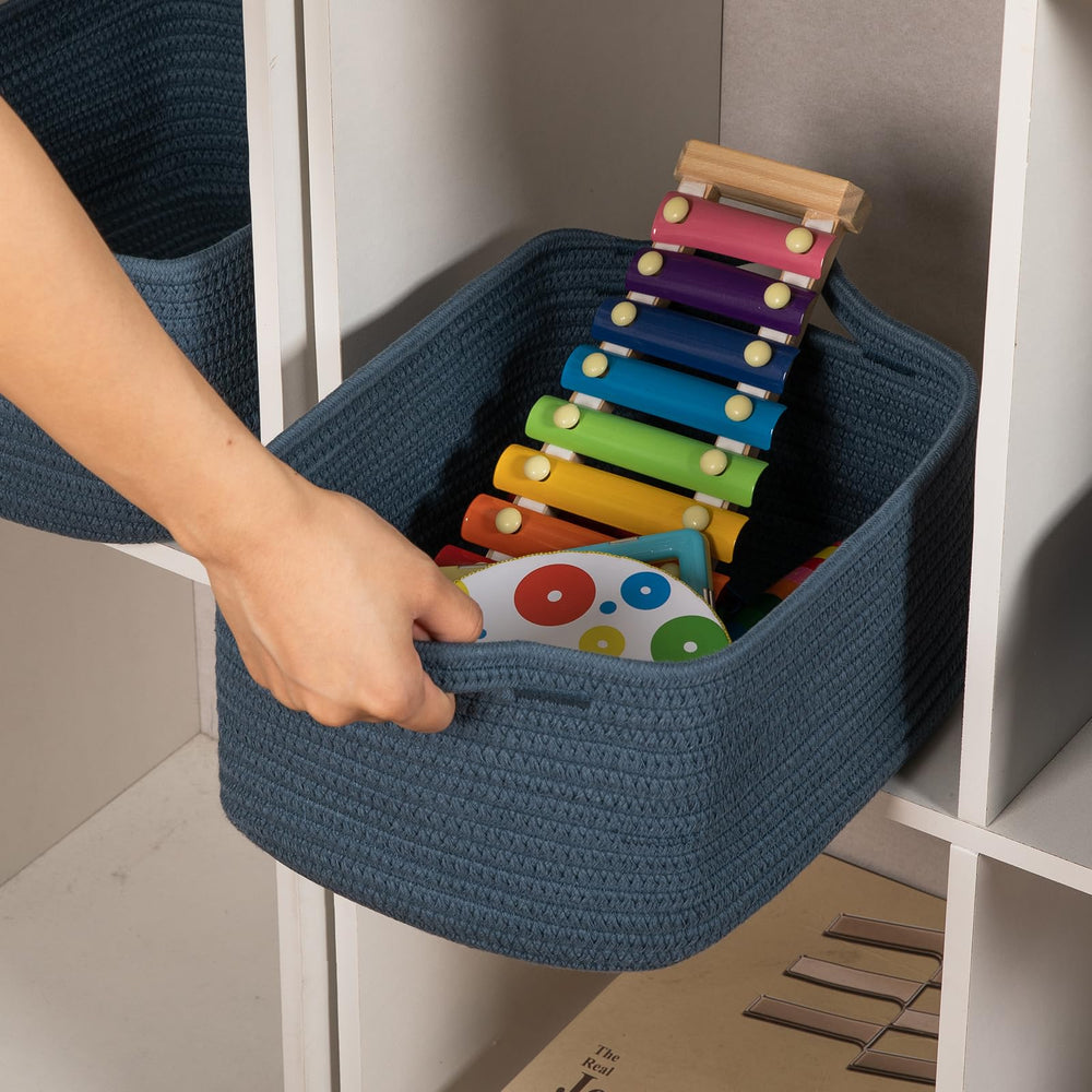 OIAHOMY blue basket on a shelf as decorative storage.
