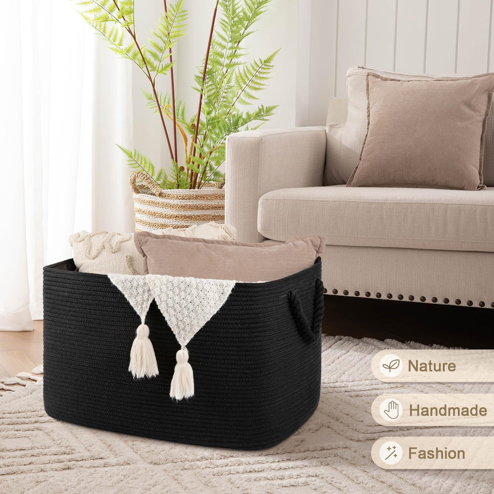 OIASKET 95L blanket basket complements living room decor in black.