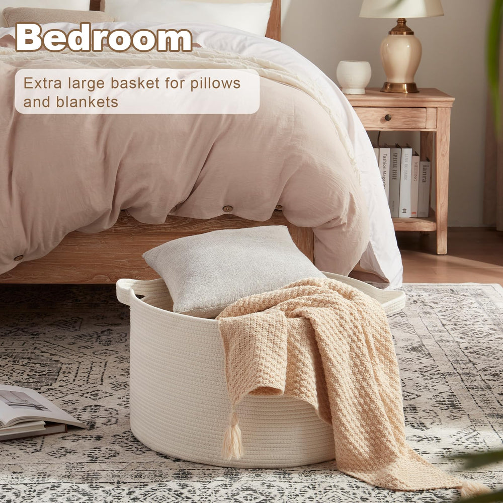 OIASKET basket with towels and pillows shows versatile home storage near bed or bath.