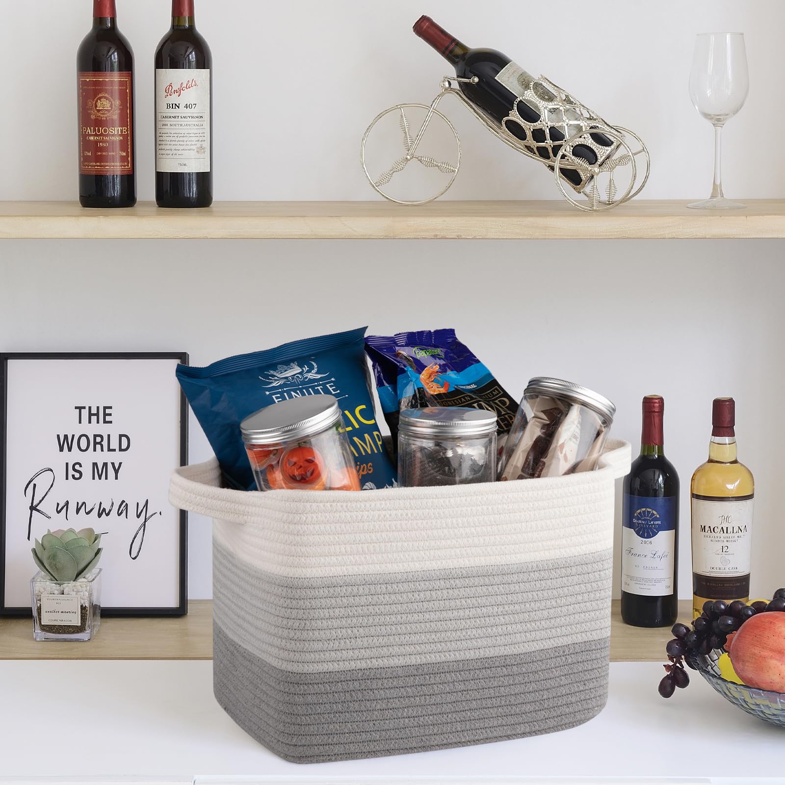 OIASKET towels stored in gradient grey baskets for bathroom organization