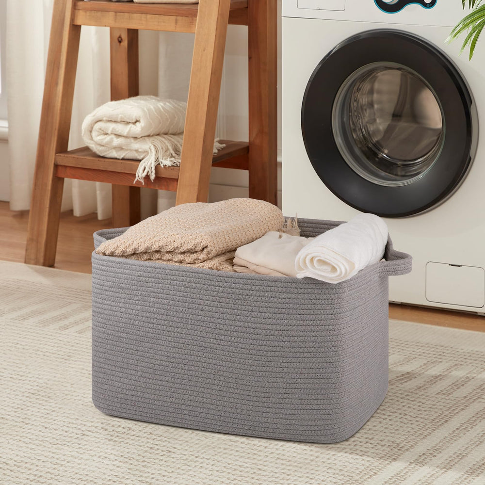 OIASKET blanket basket in bedroom keeps essentials within reach during cozy evenings.