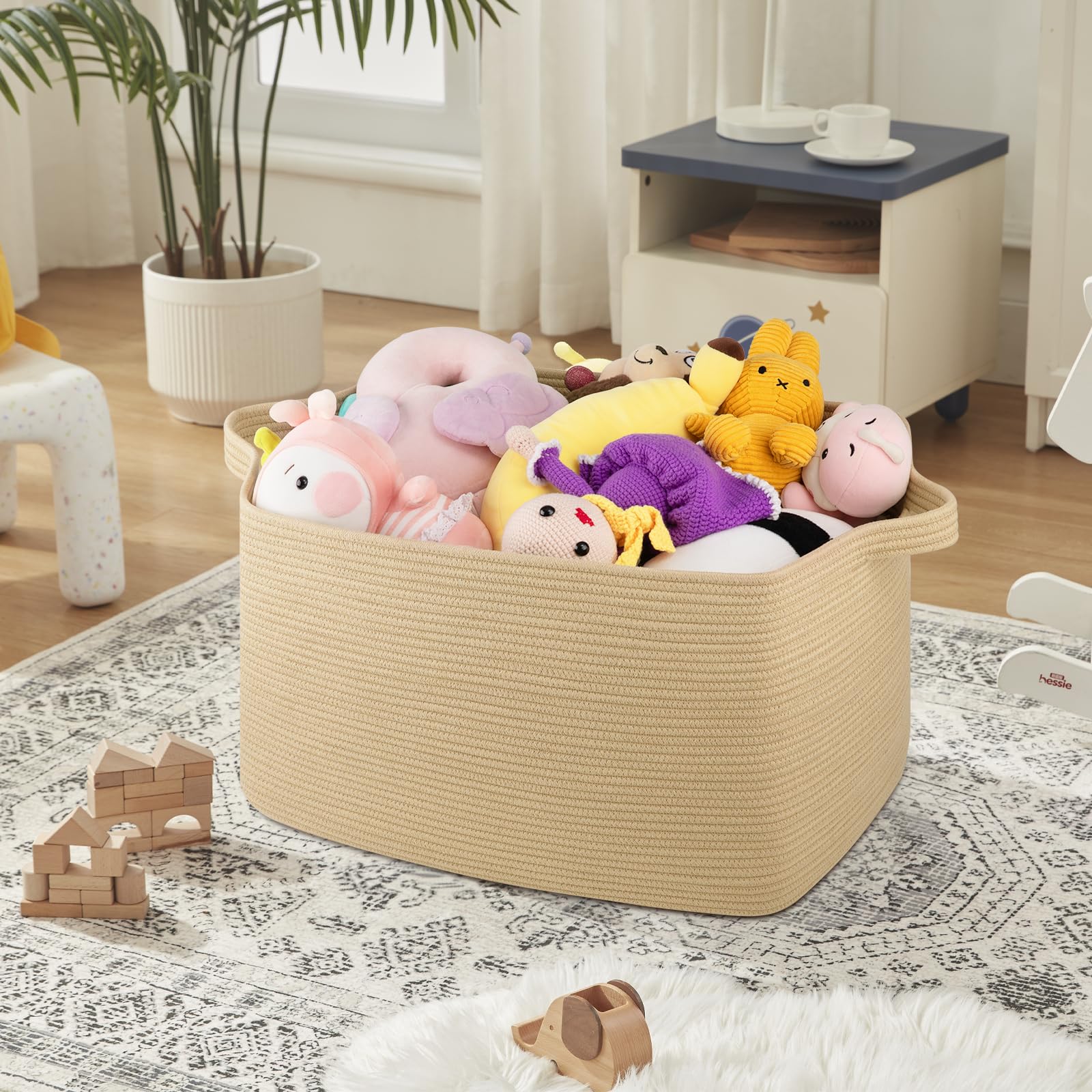 OIASKET blanket basket in living room demonstrates versatile storage and easy access.