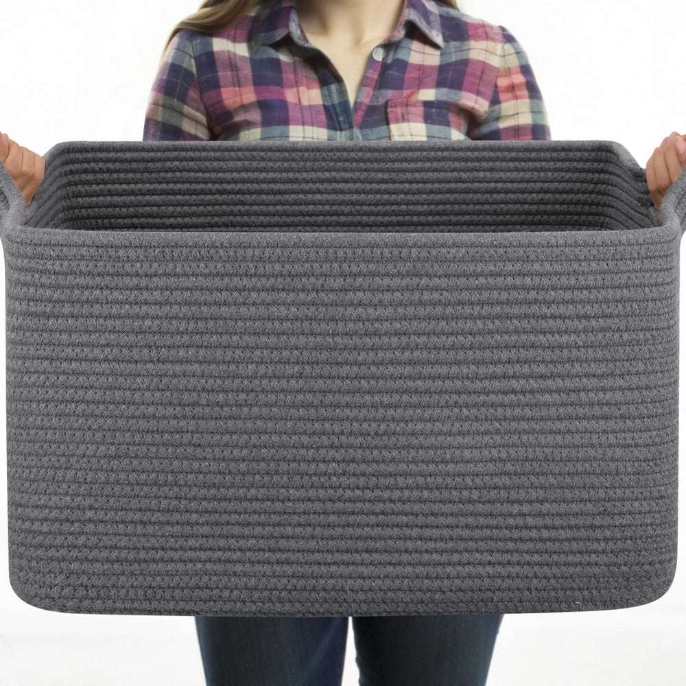 OIASKET large basket neatly stores blankets for tidy living spaces.