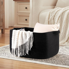 OIASKET living-room setup image shows black basket blending with neutral decor.